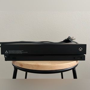 Used Xbox One X in great working condition.